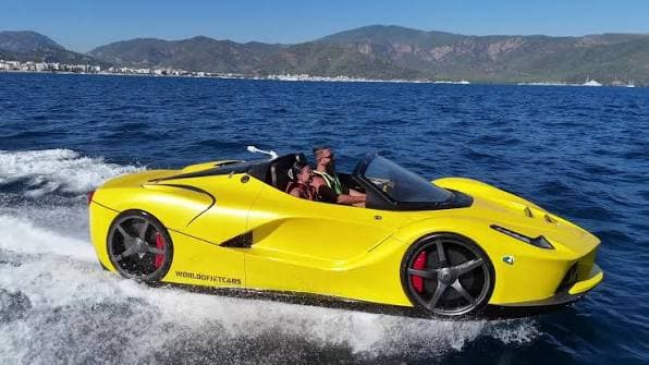 Jet car horsepower in action — WaterBoatCar Ferrari-inspired jetcar accelerating on open water