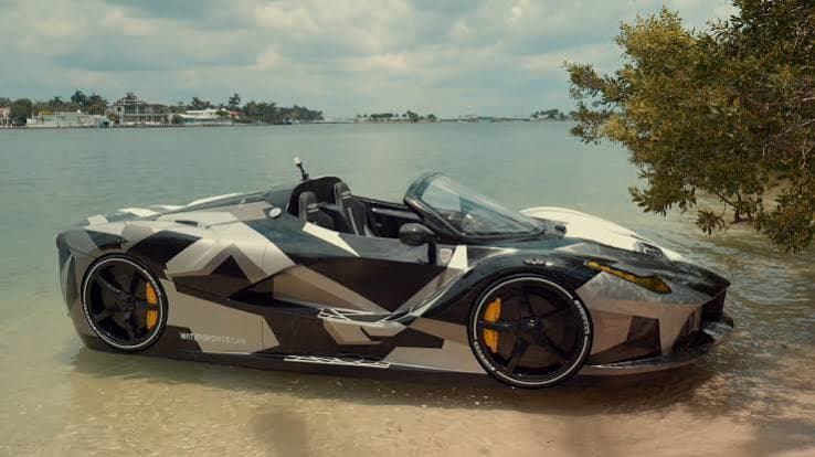 Jet car safety features — WaterBoatCar camo-wrapped jetcar with no exposed propeller resting in shallow water