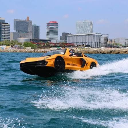 Can you drive a jet car on the road: WaterBoatCar McLaren-inspired orange jetcar speeding through city harbour