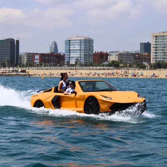 How do jet cars work: WaterBoatCar Lamborghini-inspired orange jetcar speeding through Barcelona harbour